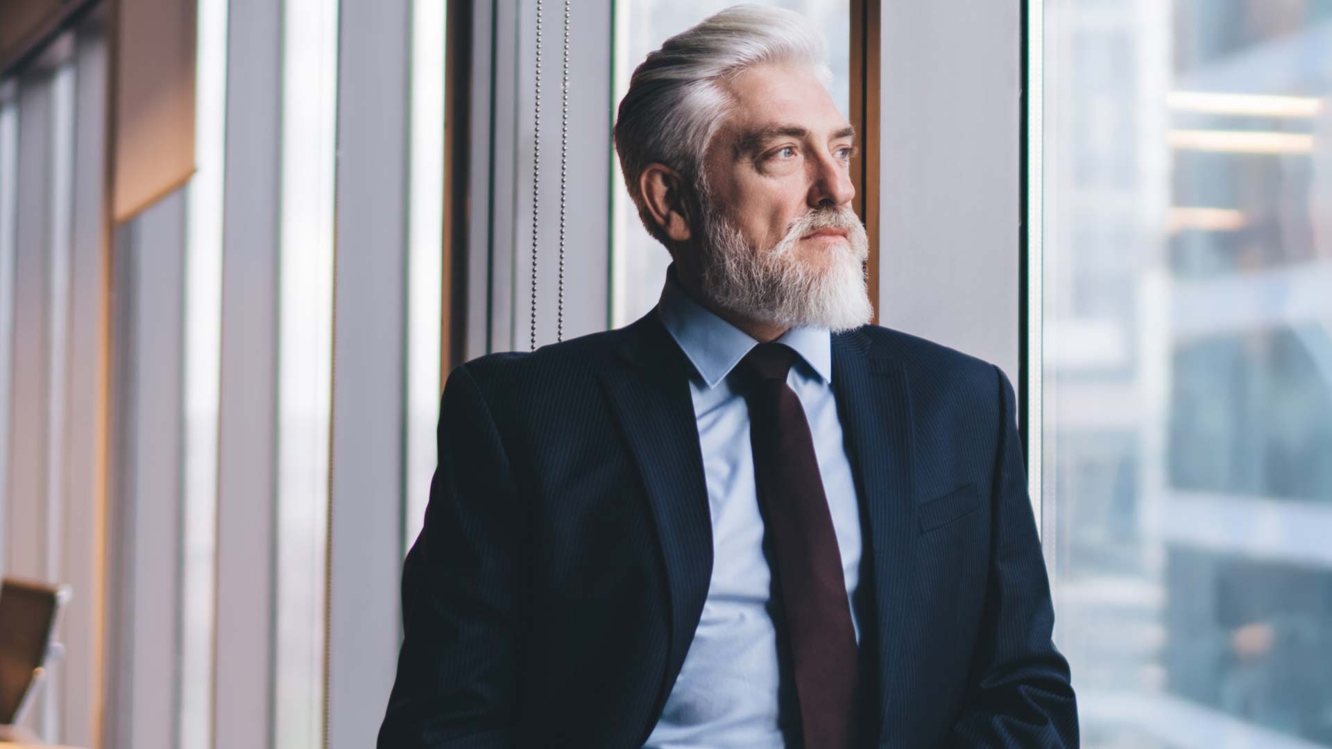 Man looking out a window