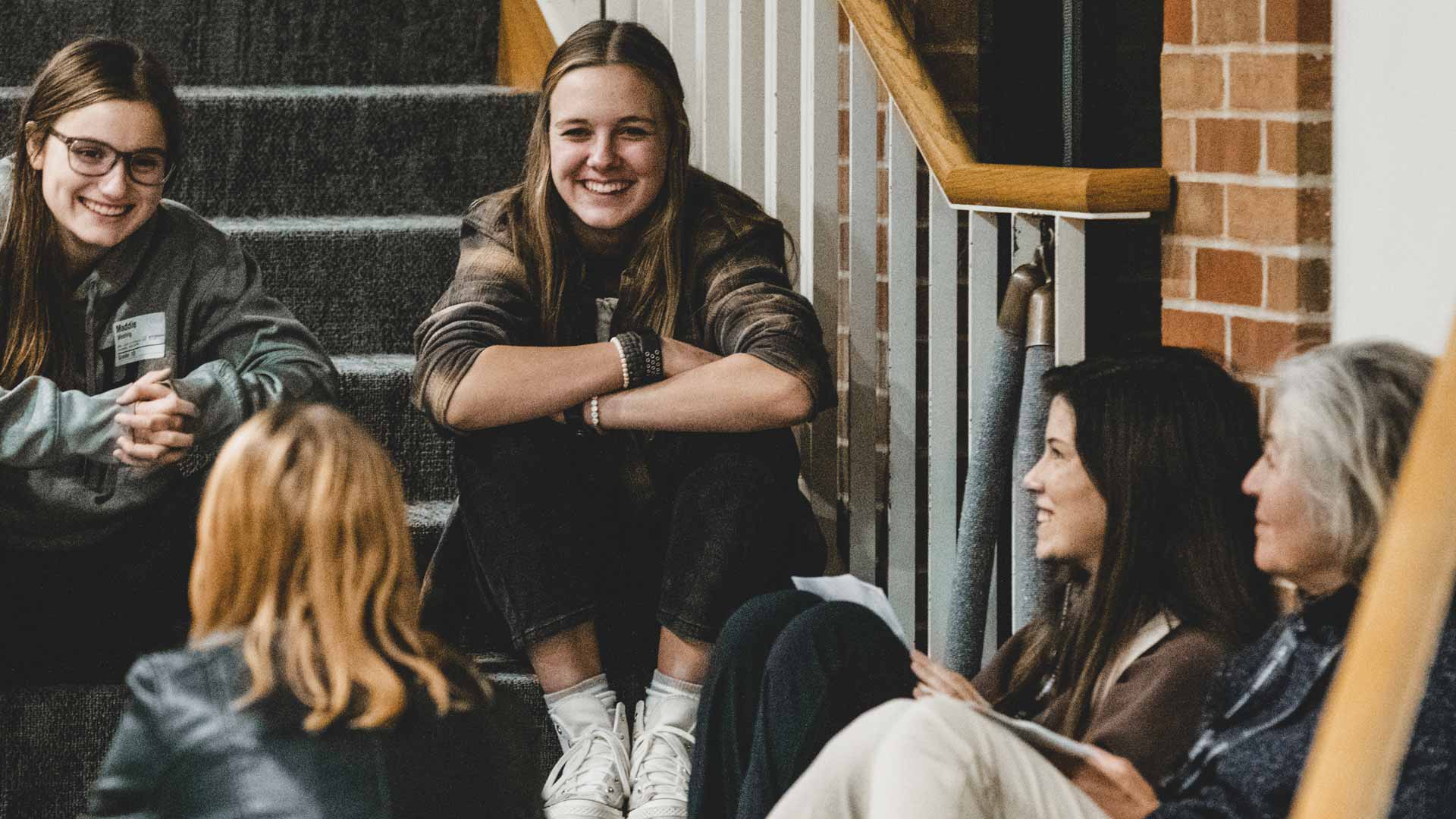 Leaders and students in a small group