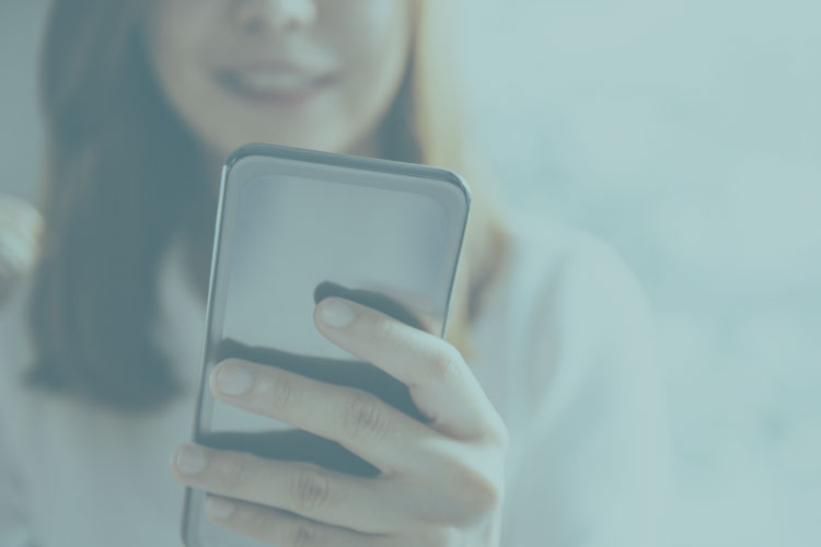 Women on phone inviting friend